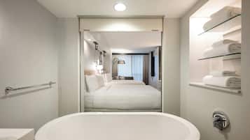 Room, 2 Queen Beds | Bathroom | Separate tub and shower, rainfall showerhead, designer toiletries