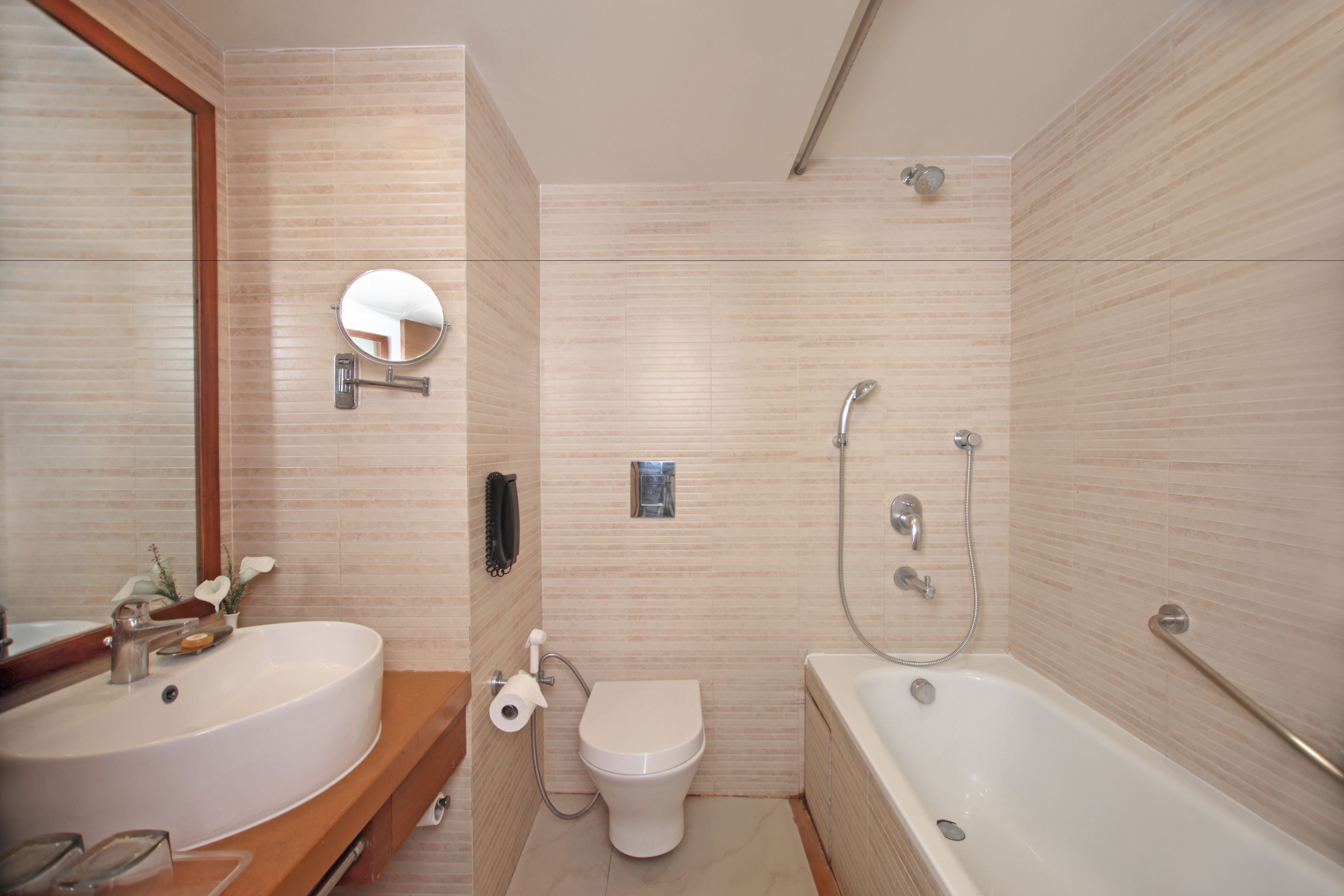 mauryan chamber  | bathroom amenities | combined shower/bathtub, free toiletries, hair dryer, bathrobes