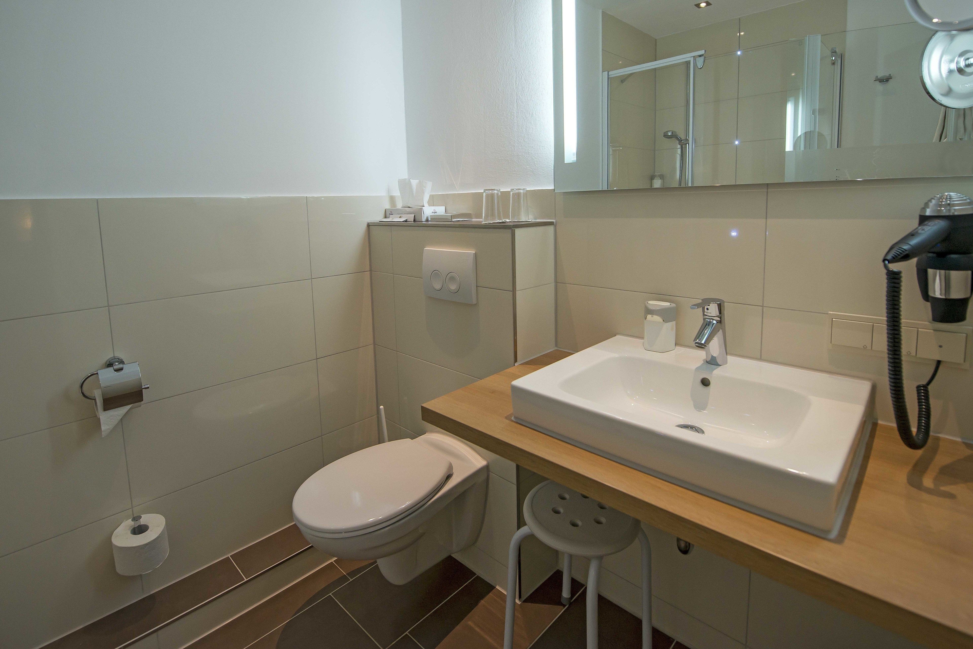 premium double room | bathroom | shower, free toiletries, hair dryer, bathrobes