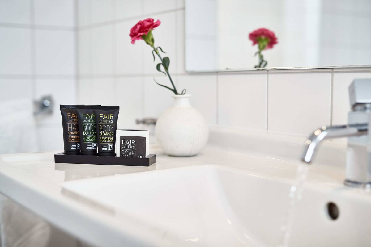 free toiletries, hair dryer, towels, soap