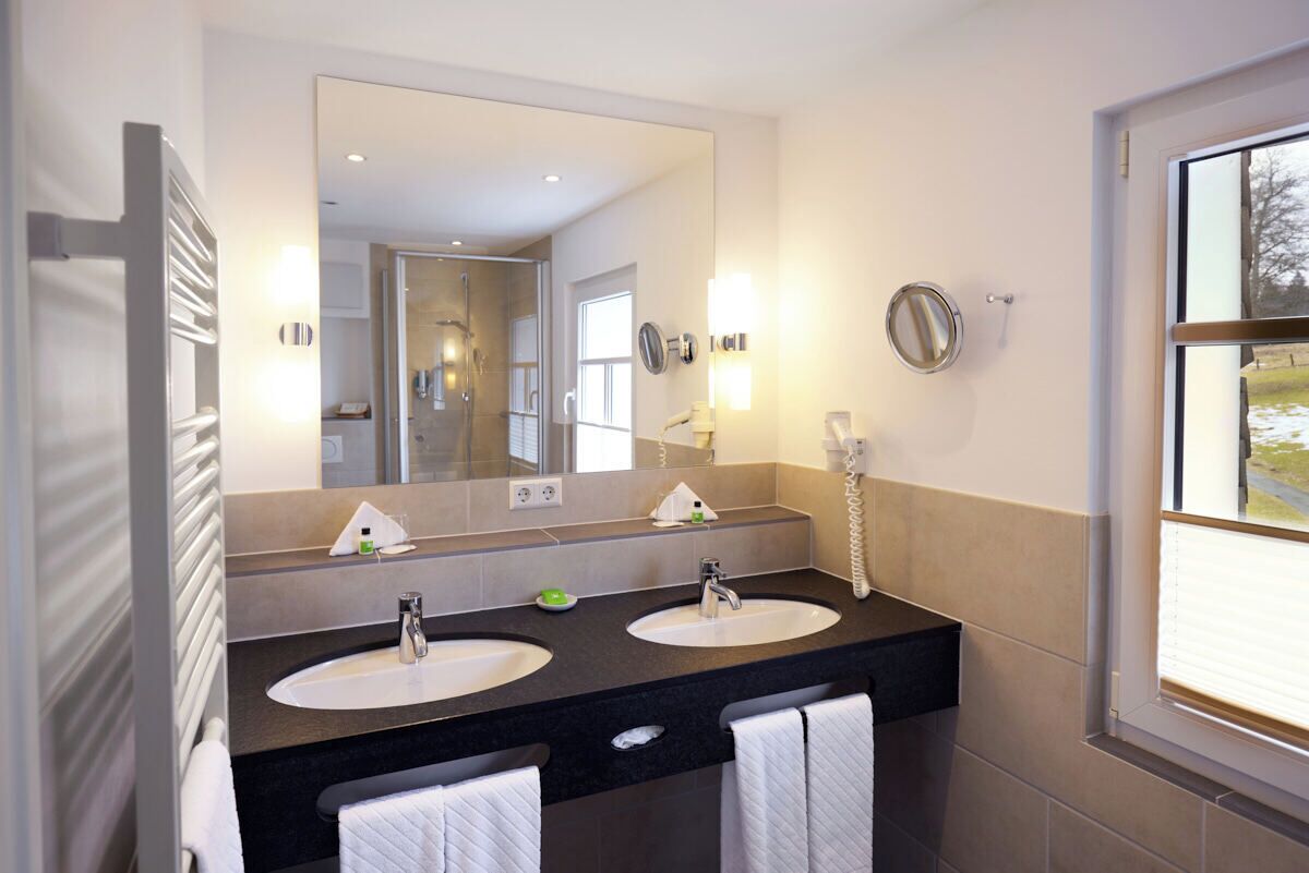 shower, hair dryer, bathrobes, towels