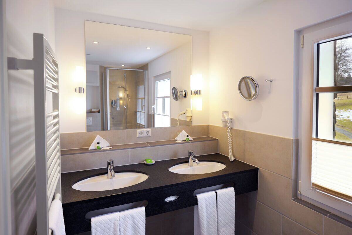 shower, hair dryer, bathrobes, towels