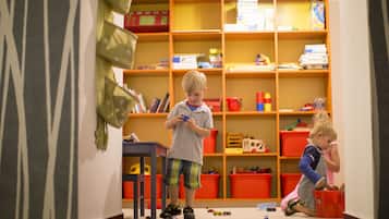 Children can learn and play in a safe, supervised environment with access to a wide range of educational materials and toys.