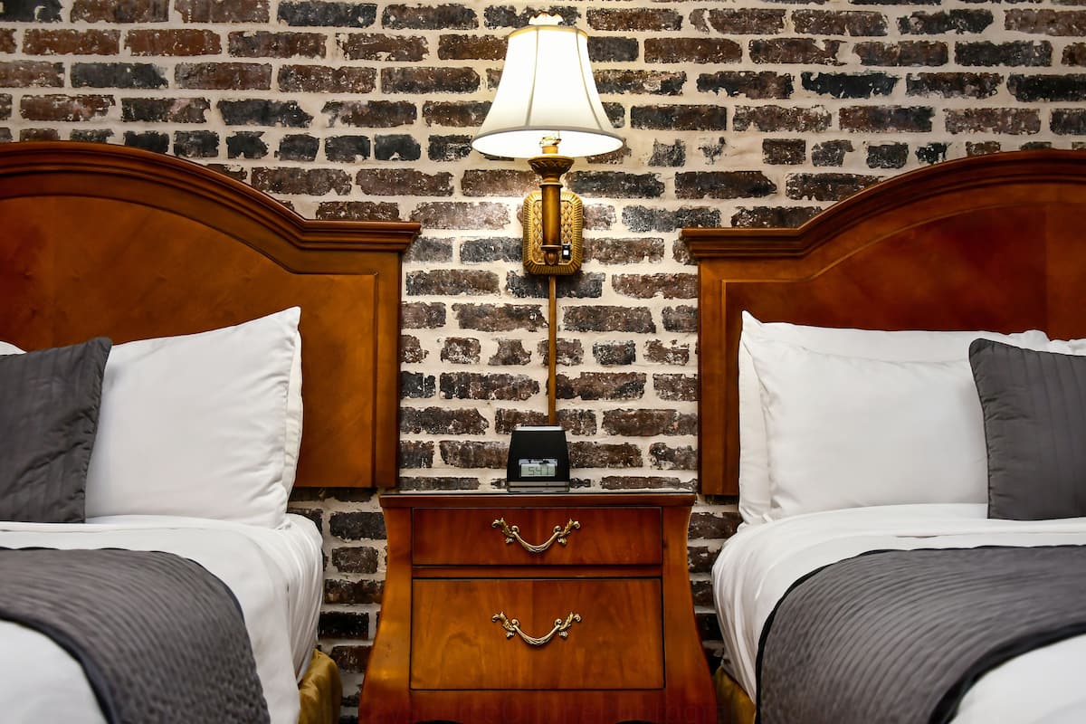 deluxe double room, 2 double beds | premium bedding, minibar, desk, iron/ironing board