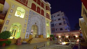 A historic building with ornate architecture and a courtyard. - Umaid Mahal - A Heritage Style Boutique Hotel (Jaipur)