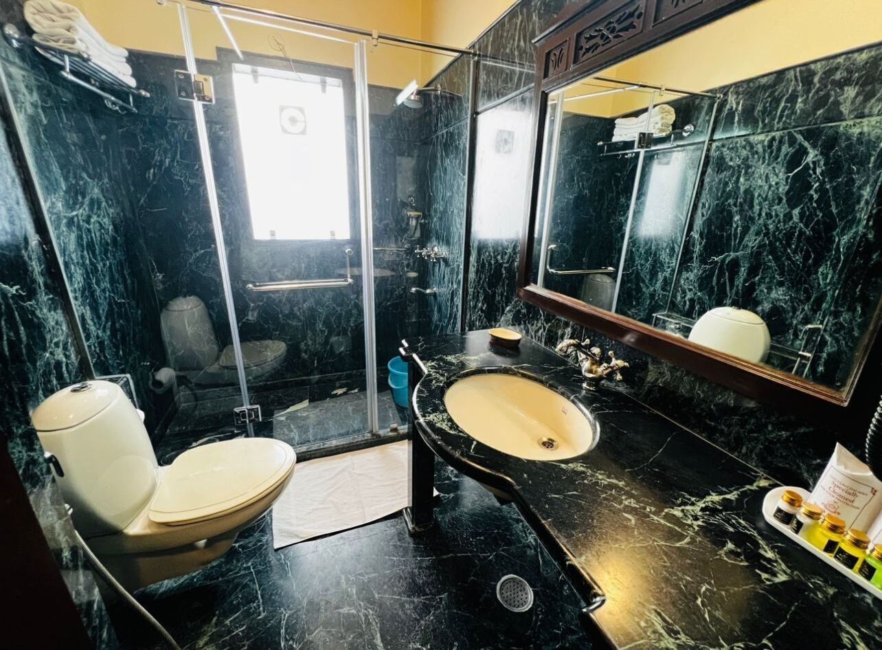 royal deluxe - free pick-up on arrival (train/bus station only) | bathroom | shower, free toiletries, hair dryer, bathrobes