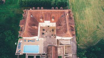 Seasonal outdoor pool, pool loungers