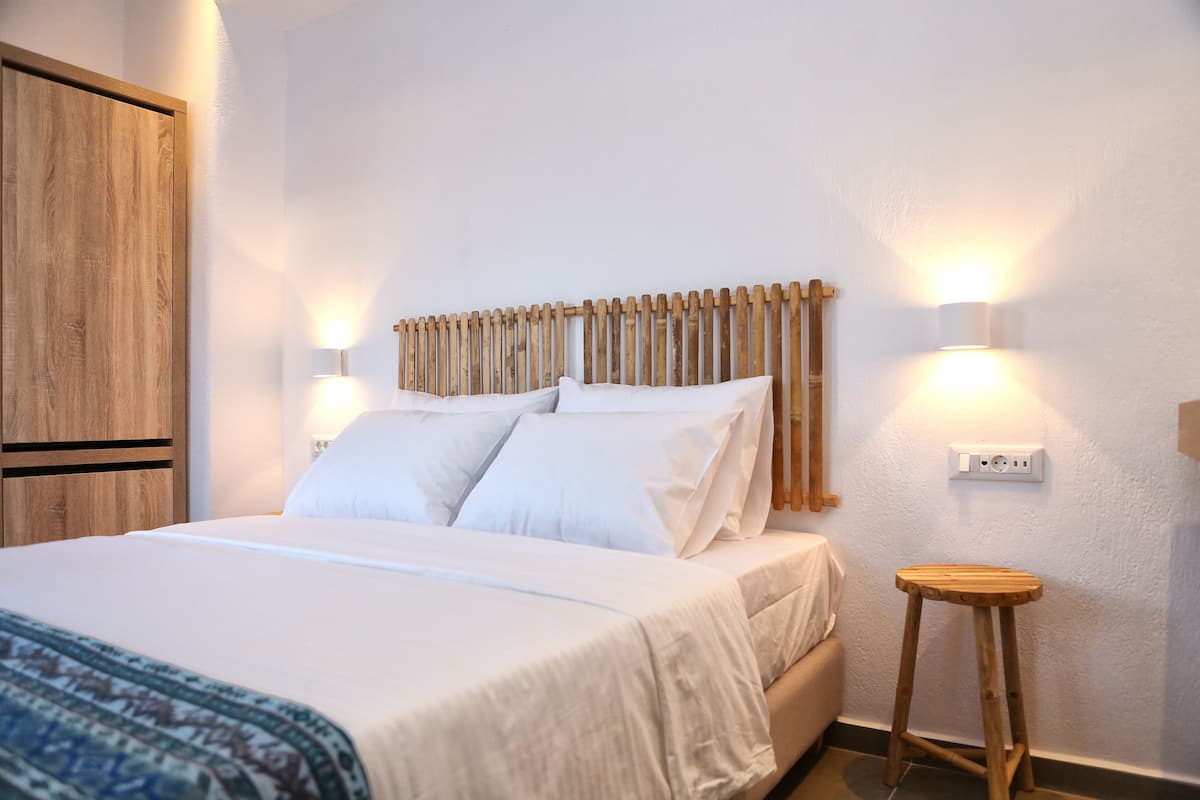 economy room | 1 bedroom, in-room safe, iron/ironing board, free cots/infant beds