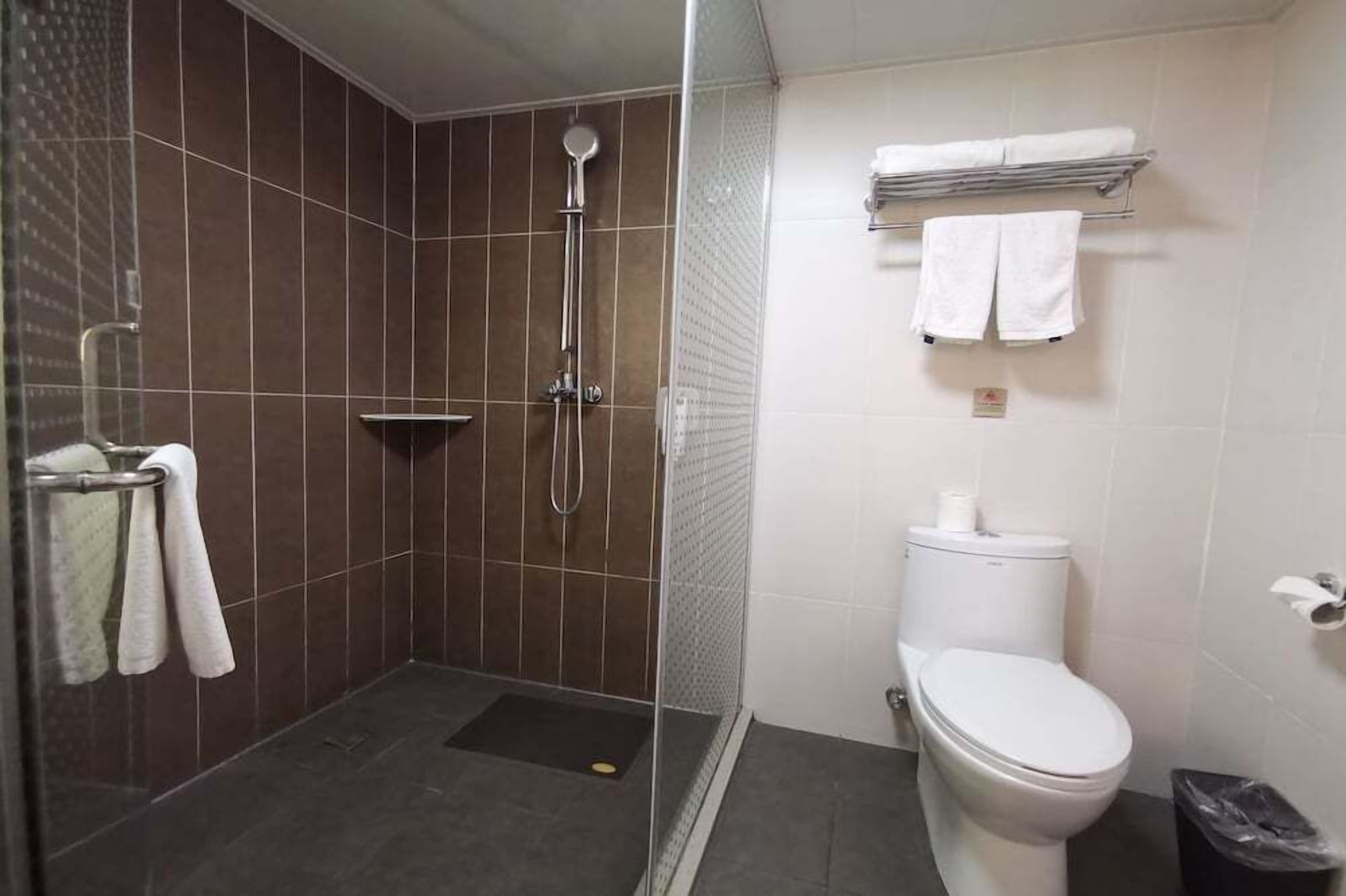 Shower, free toiletries, hair dryer, towels