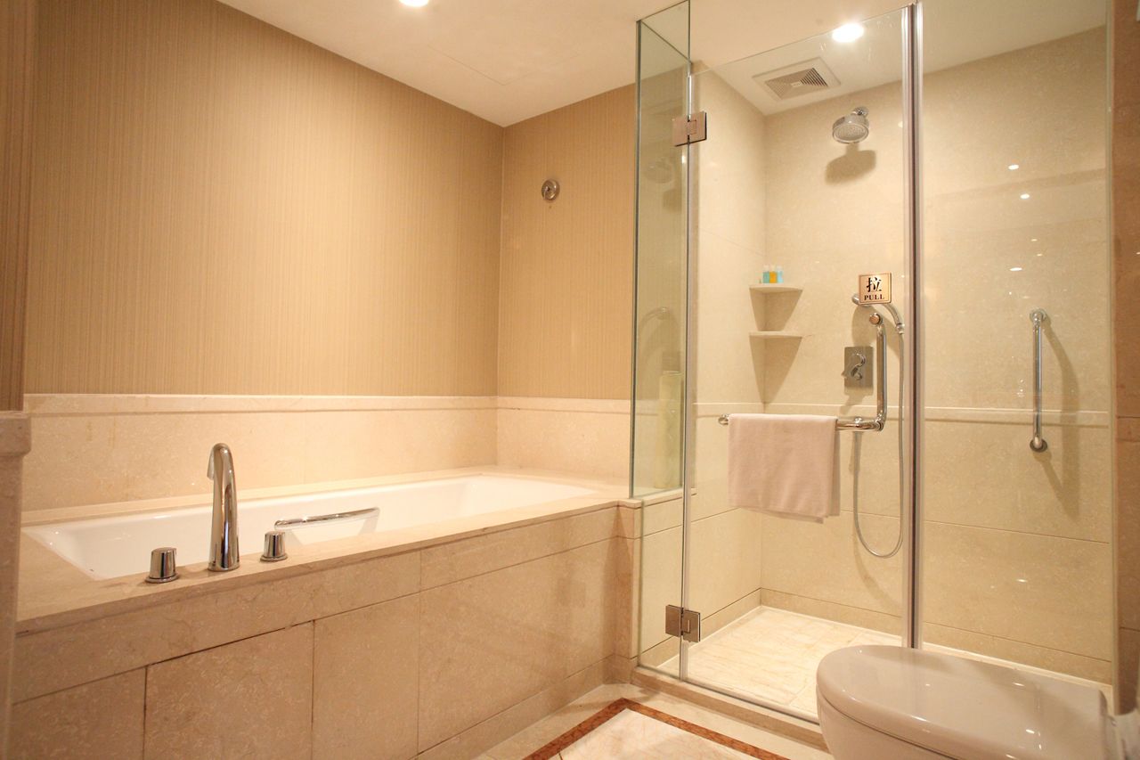 deep-soaking bathtub, rainfall showerhead, free toiletries, hair dryer