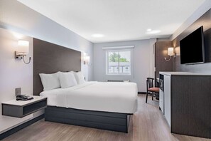 Room, 1 King Bed, Non Smoking | Desk, iron/ironing board, free cribs/infant beds, rollaway beds - Days Inn & Suites by Wyndham Niagara Falls/Buffalo (Niagara Falls)