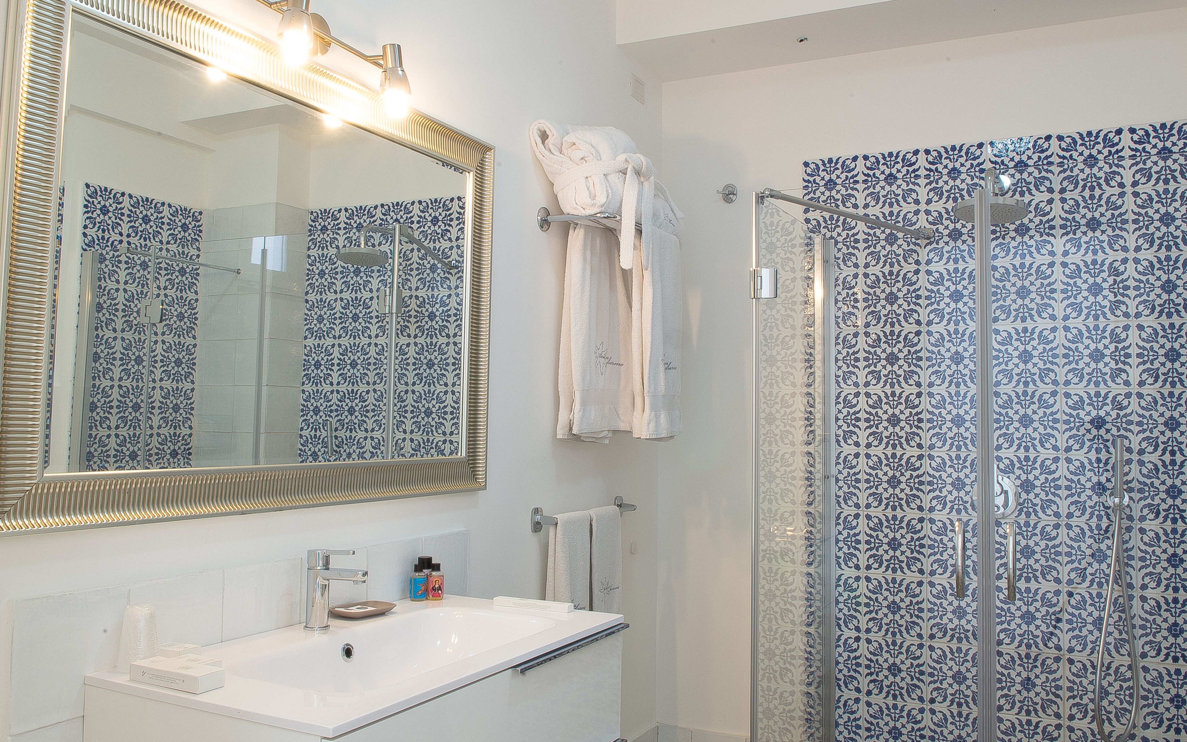 combined shower/bathtub, designer toiletries, hair dryer, bidet