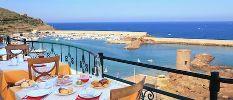 Lunch, dinner served; British cuisine, pool views