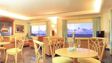 Lunch, dinner served; British cuisine, pool views