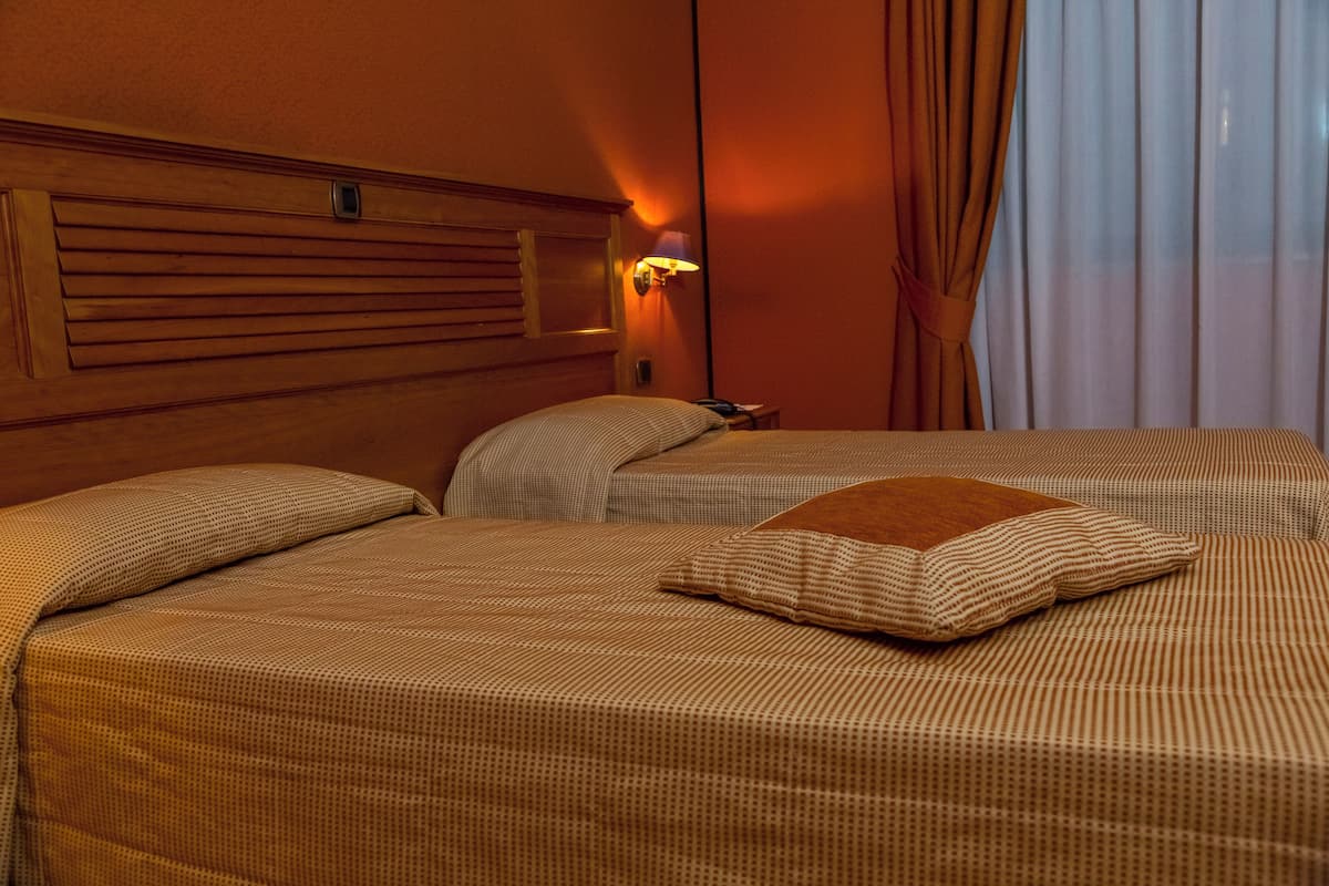 Hypo-allergenic bedding, down duvets, minibar, in-room safe