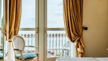 Deluxe Room, Balcony, Lake View | Minibar, in-room safe, desk, free WiFi