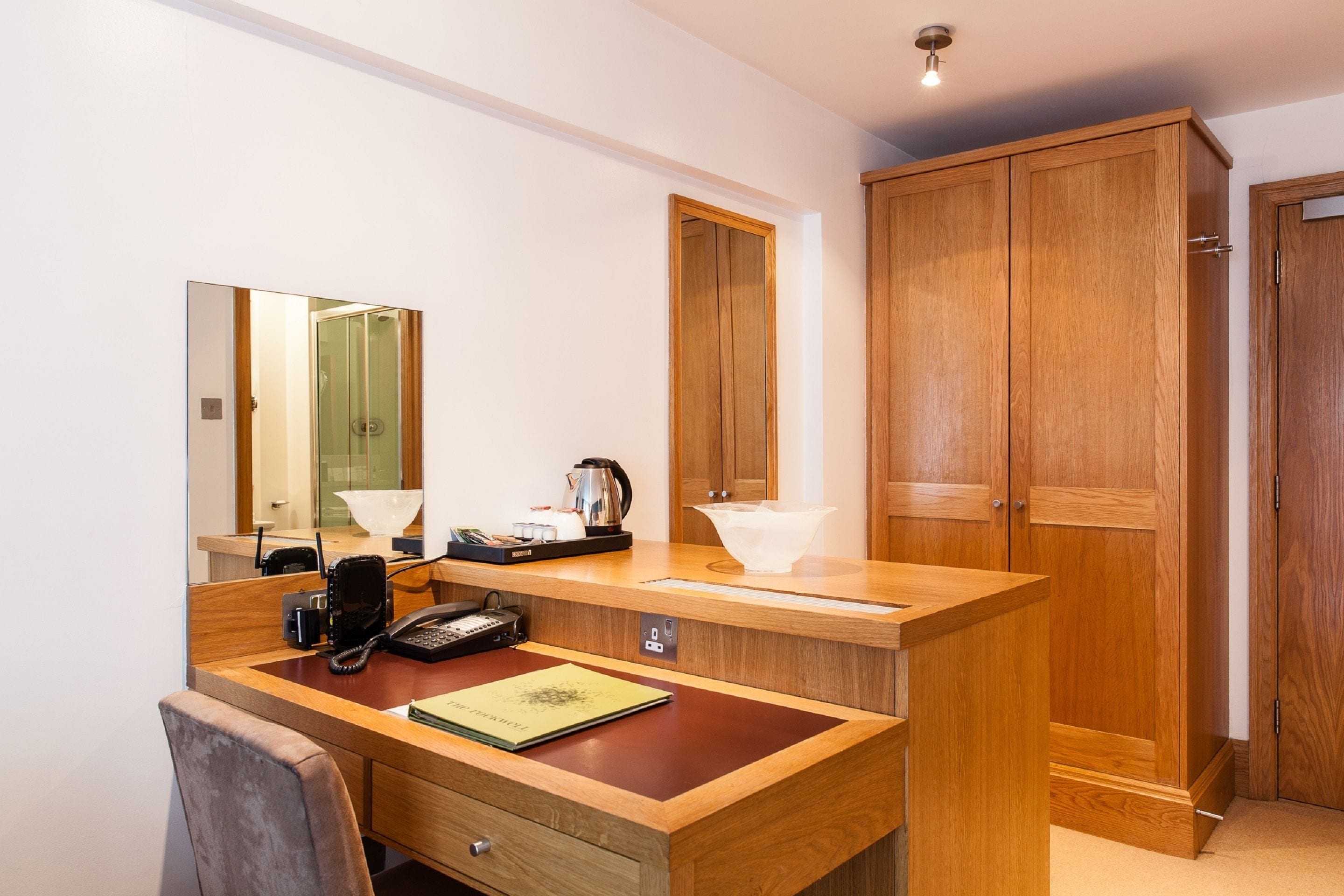 garden room | minibar, in-room safe, desk, blackout curtains