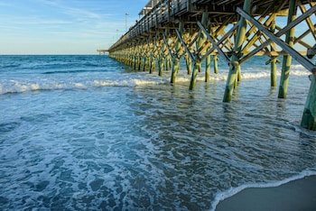 On the beach, surfing at Westgate Myrtle Beach Oceanfront Resort