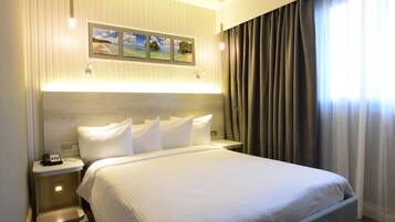 In-room safe, desk, blackout curtains, iron/ironing board