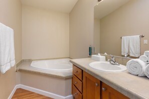 Separate tub and shower, deep soaking tub, free toiletries, hair dryer