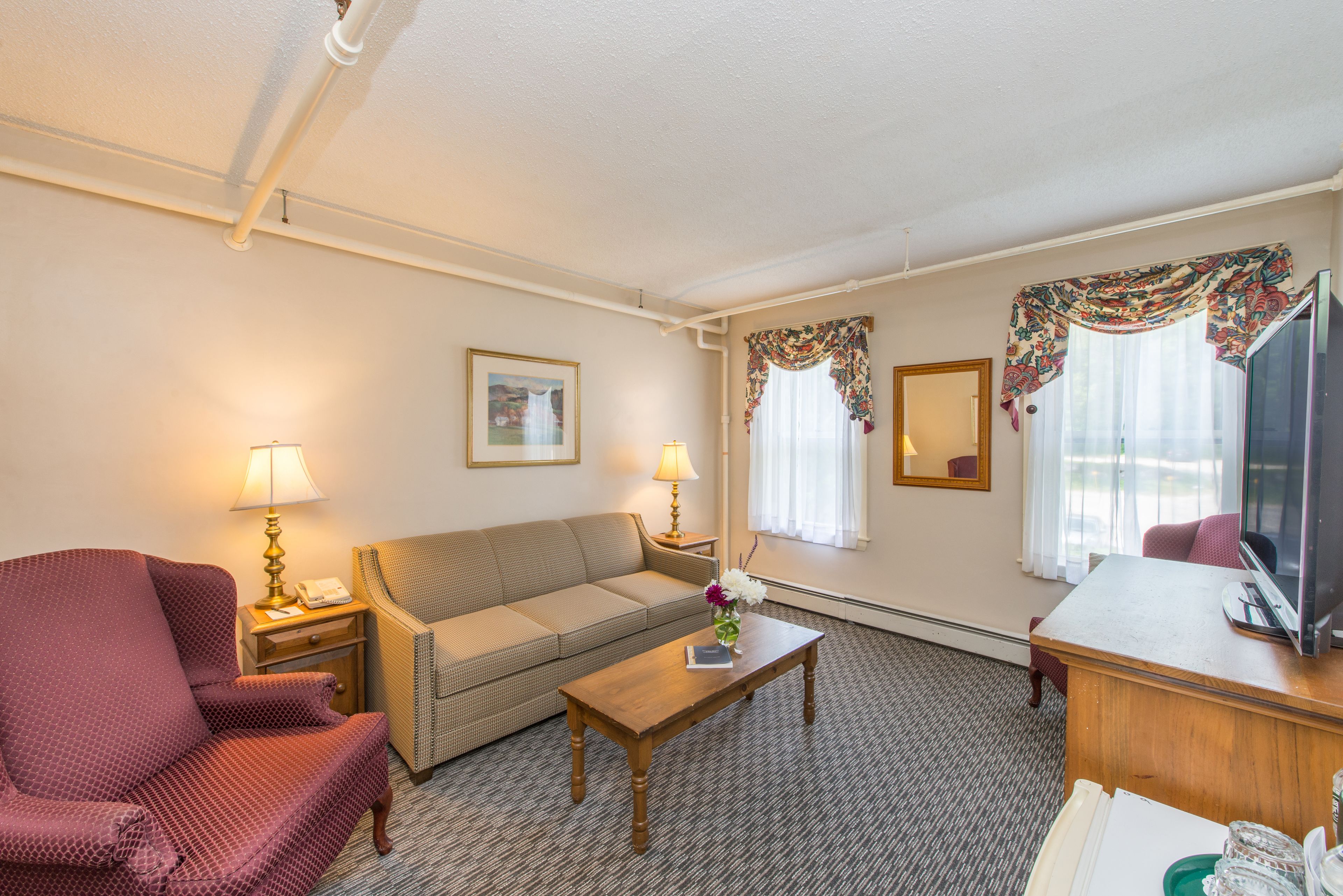 suite, 1 queen bed with sofa bed, mountain view (2 rooms) | living area | 32-inch flat-screen tv with cable channels, tv