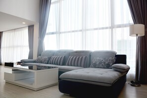 Premier Loft, 2 Bedrooms, Kitchen | Living room | Flat-screen TV