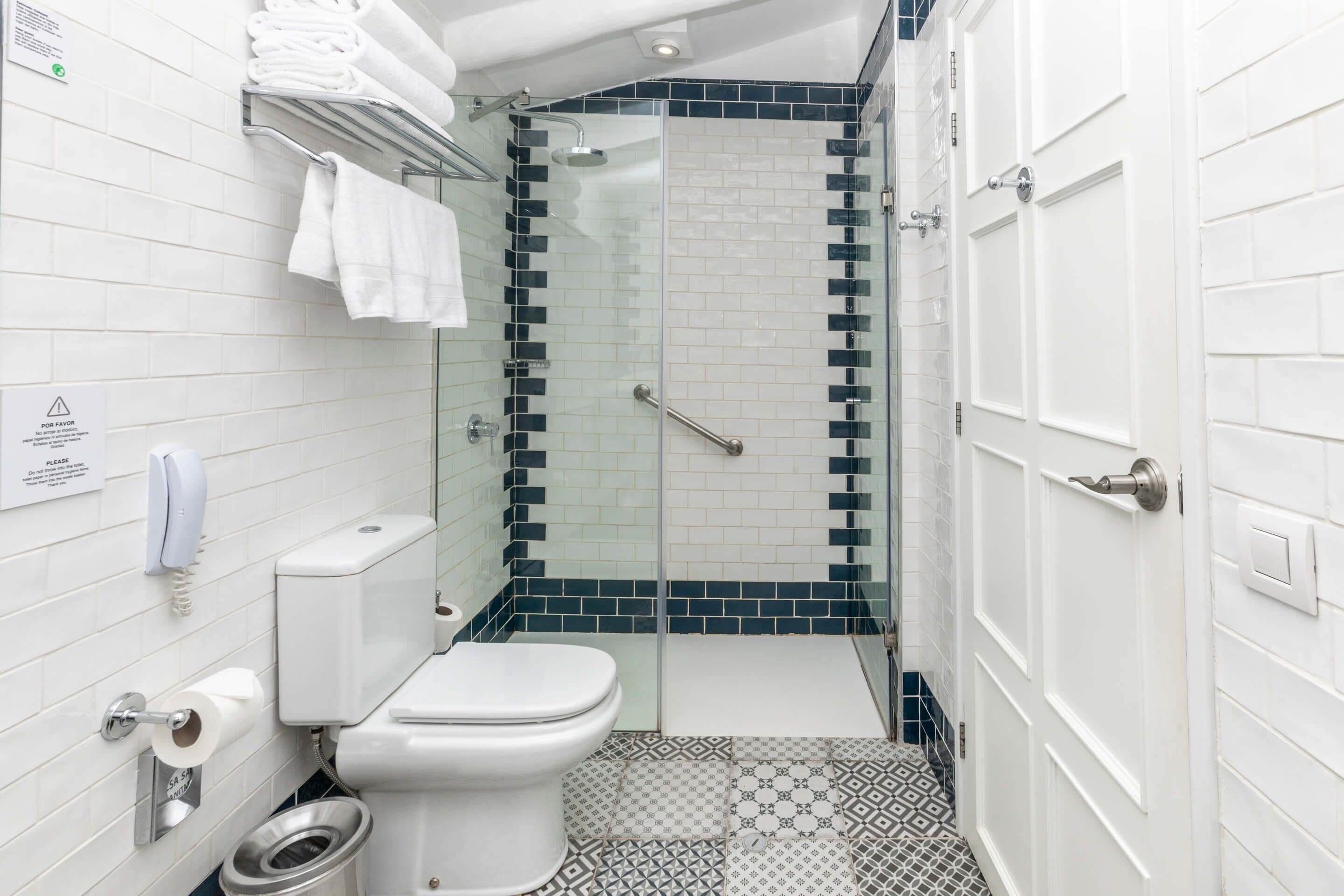 superior triple room | bathroom | shower, free toiletries, hair dryer, bathrobes