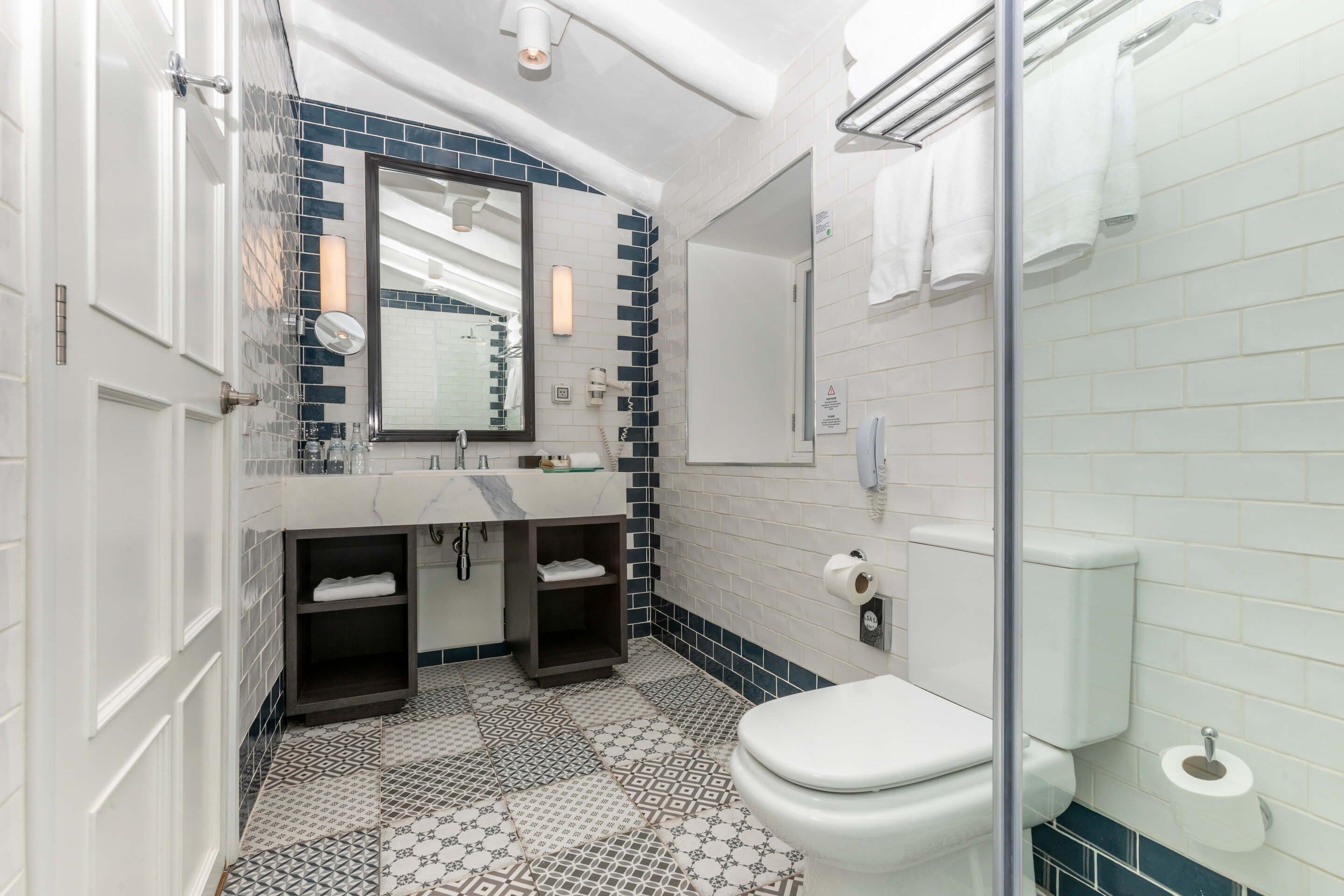 superior triple room | bathroom | shower, free toiletries, hair dryer, bathrobes