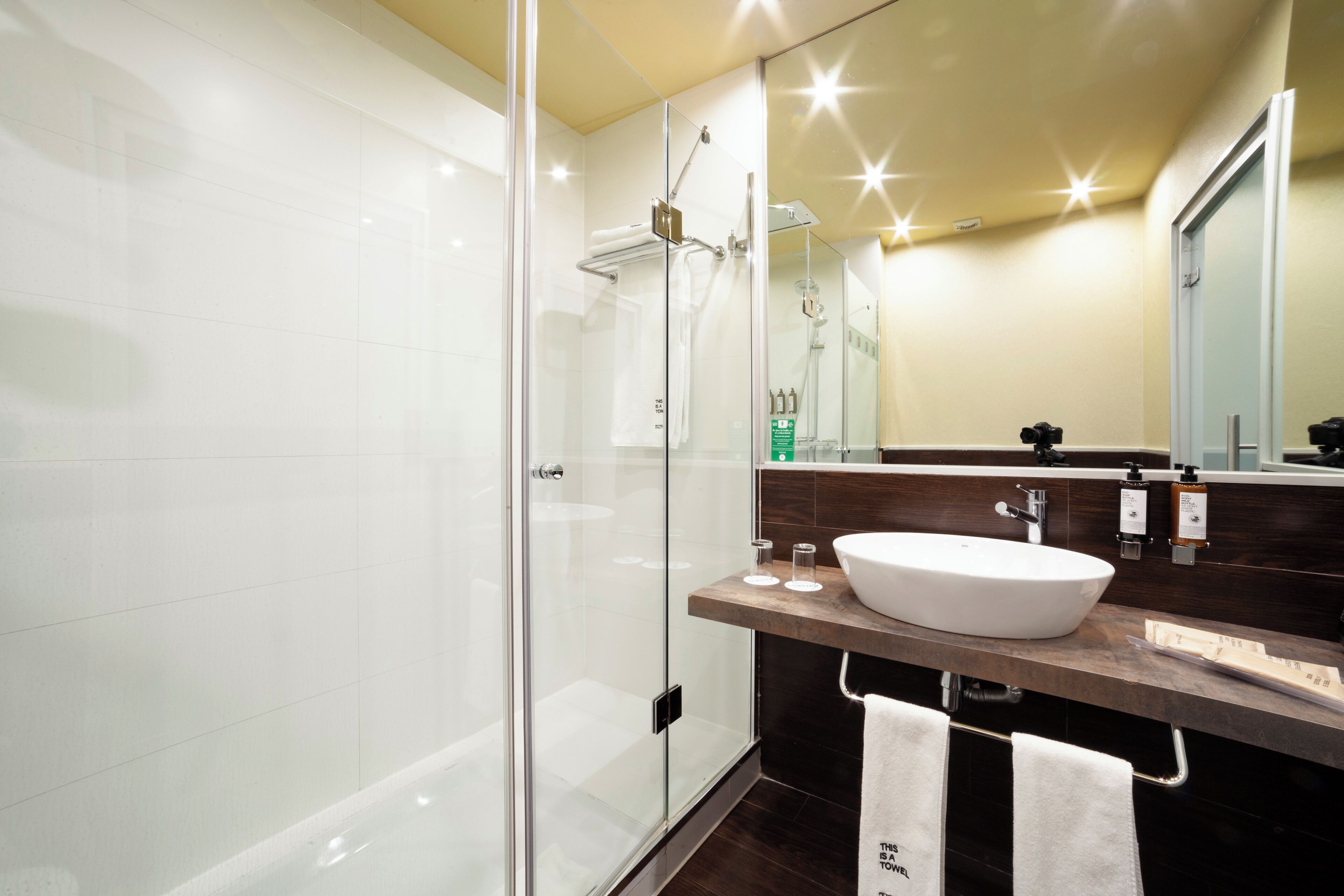 deep-soaking bathtub, hair dryer, towels, soap