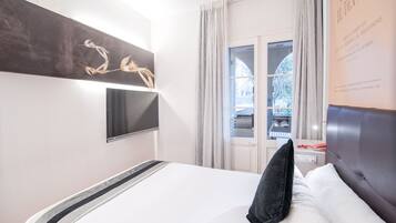 Chambre Simple | Minibar, coffres-forts dans les chambres, bureau, rideaux occultants