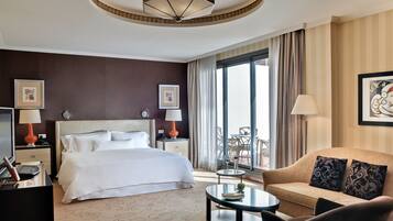 Luxe beddengoed, een minibar, een kluis op de kamer, een bureau