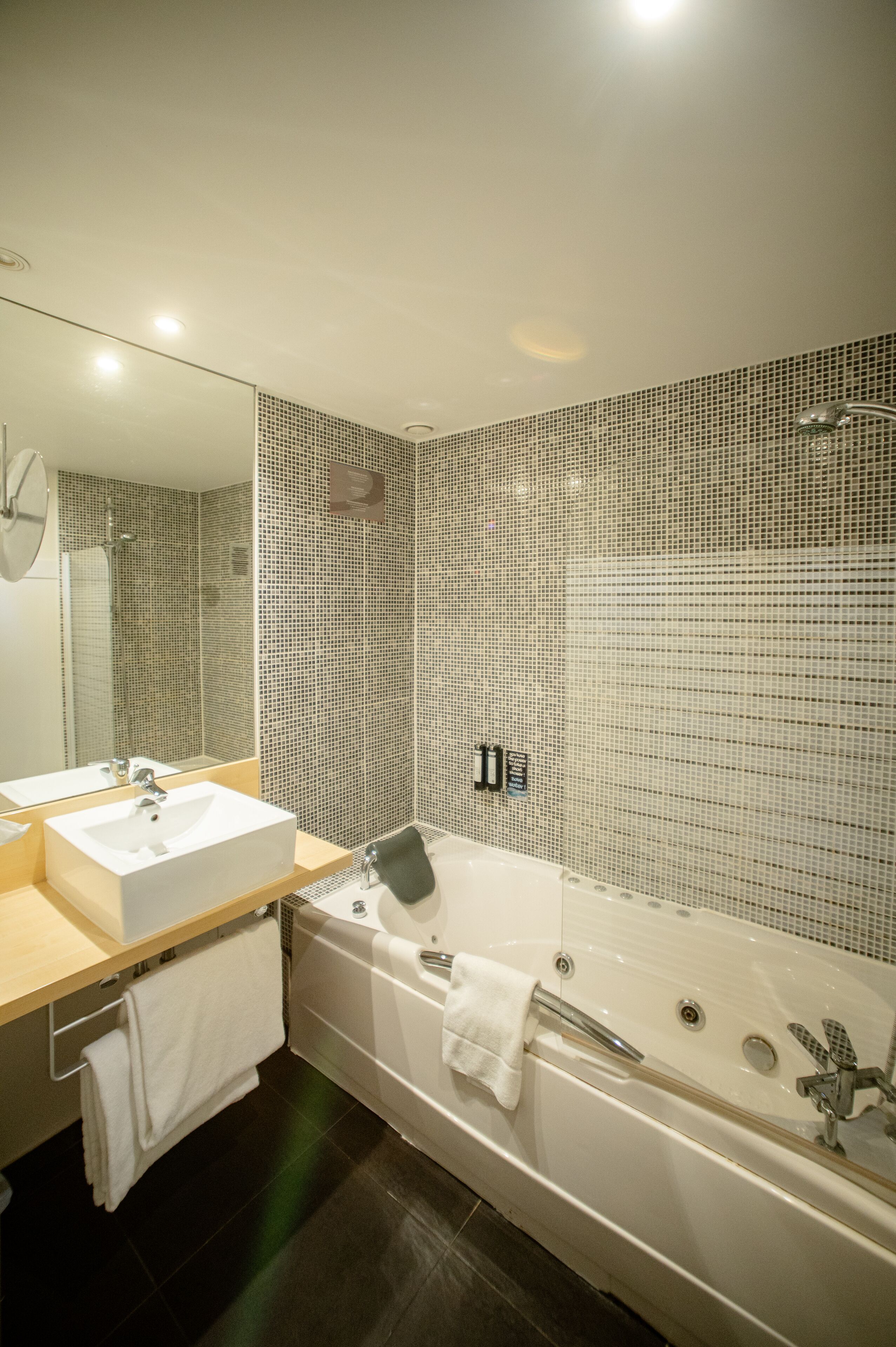 suite, jetted tub | bathroom | combined shower/bathtub, designer toiletries, hair dryer, towels
