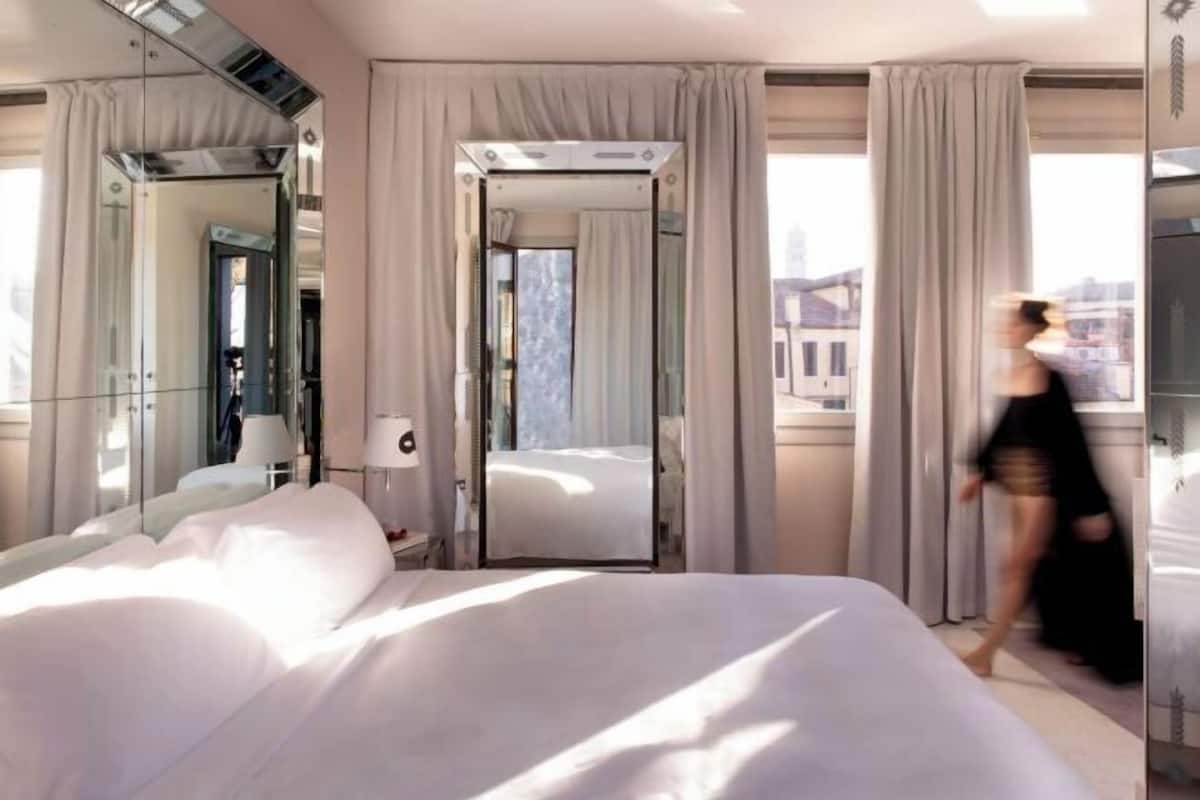 Down comforters, minibar, in-room safe, blackout drapes