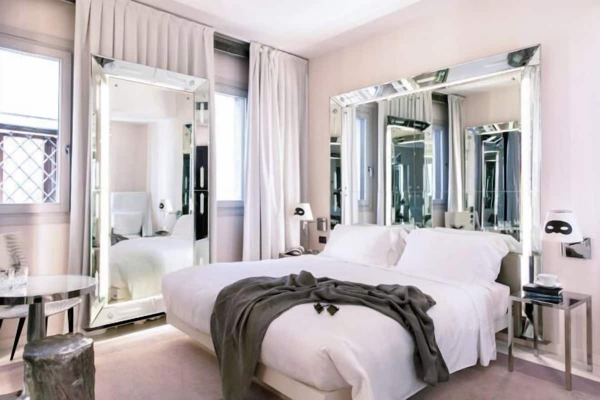 Down comforters, minibar, in-room safe, blackout drapes