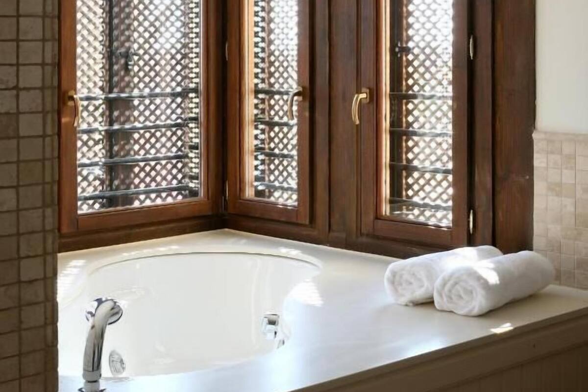 shower, eco-friendly toiletries, hair dryer, bathrobes