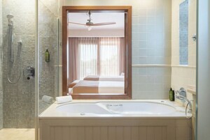 Shower, eco-friendly toiletries, hair dryer, bathrobes