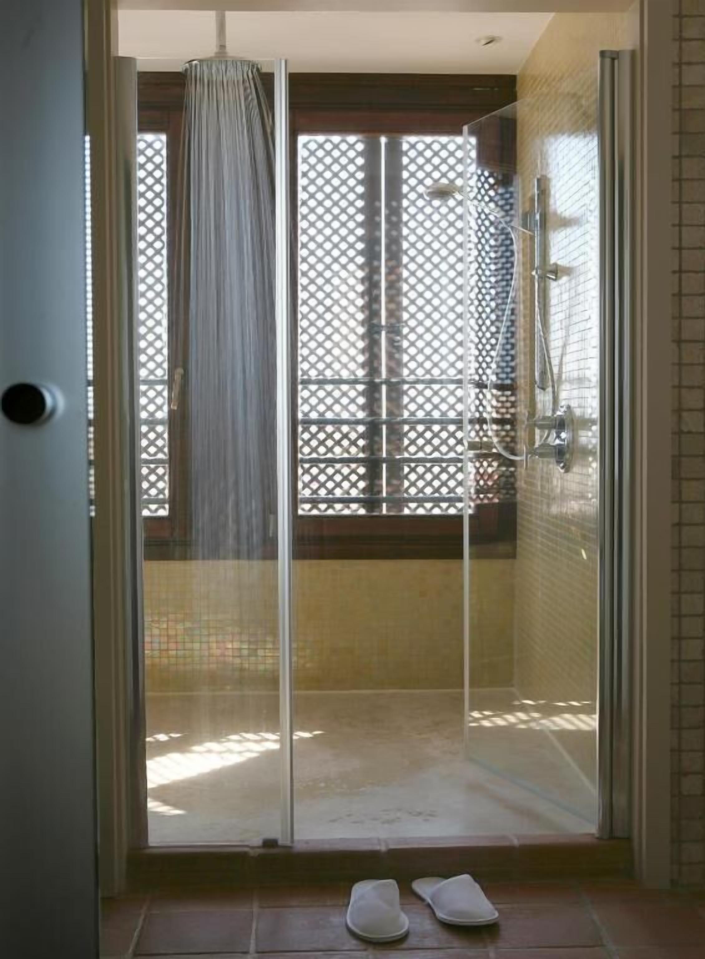 shower, eco-friendly toiletries, hair dryer, bathrobes