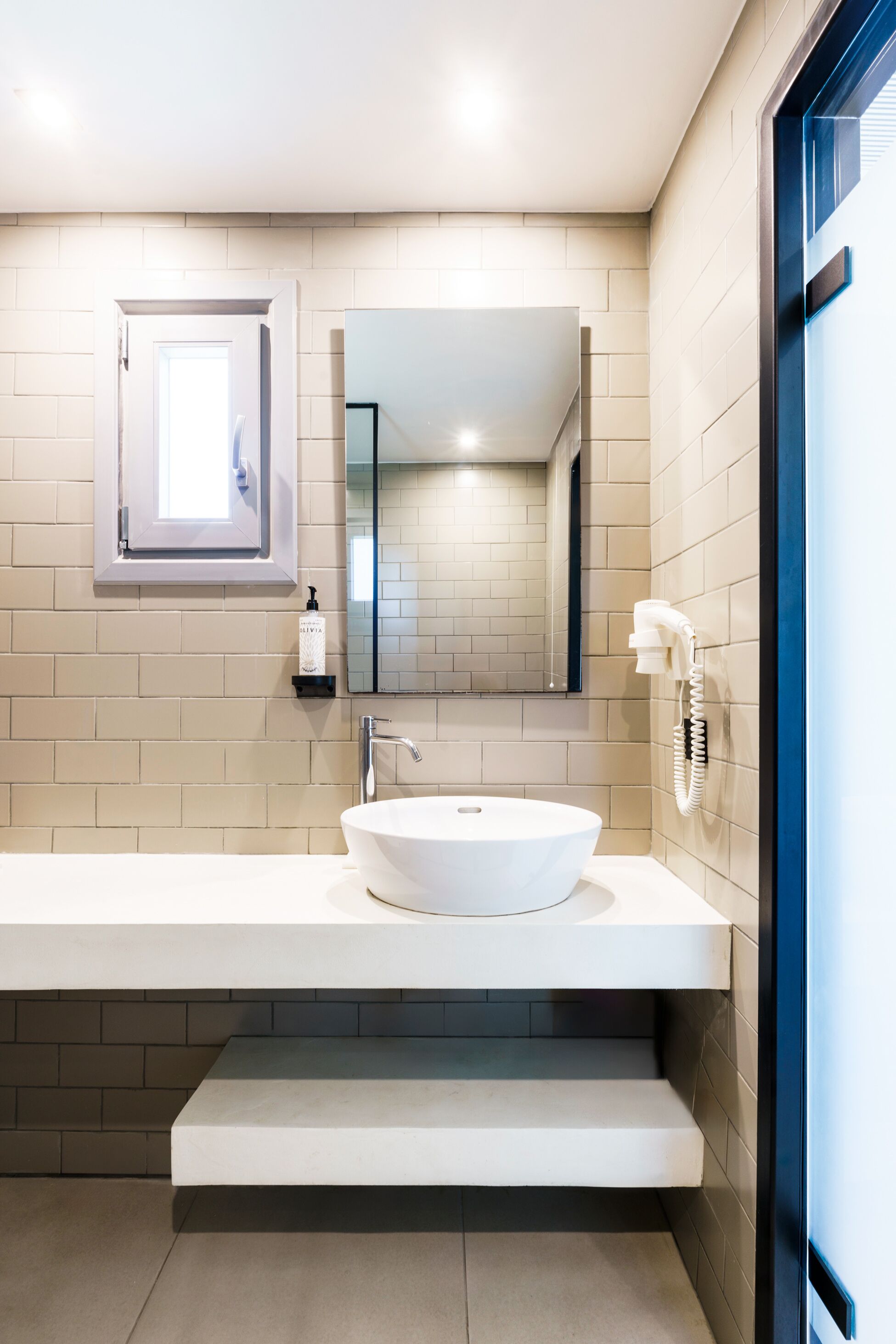 premium beachfront bungalow | bathroom | shower, free toiletries, hair dryer, slippers