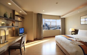 Ropa de cama de alta calidad y minibar 