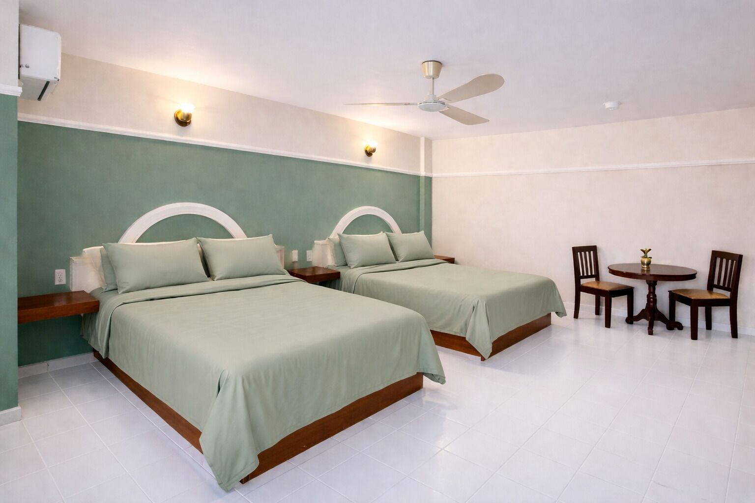 Junior Quadruple Room, 2 Queen Beds, Terrace, City View | Minibar, individually decorated, individually furnished