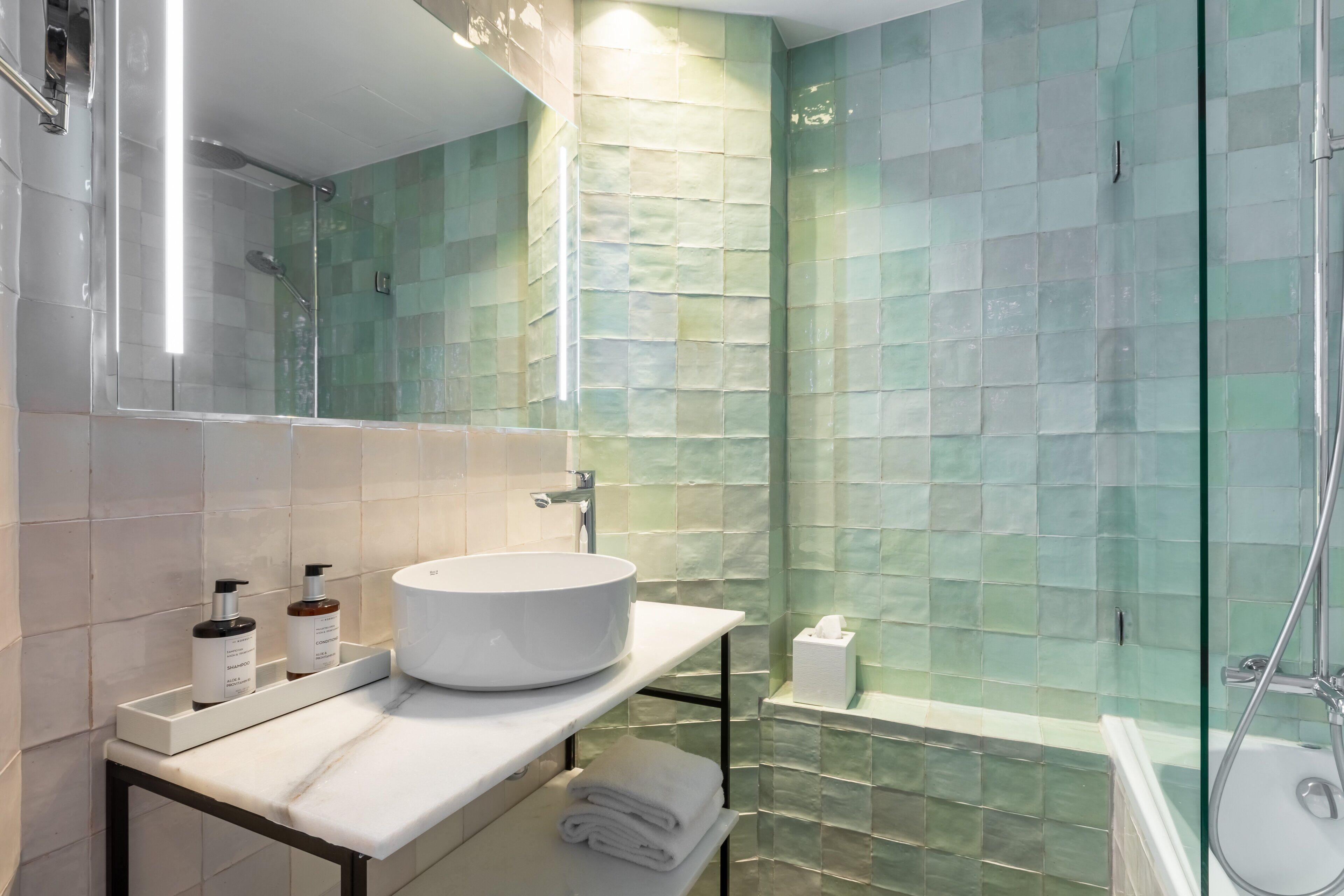 rainfall showerhead, eco-friendly toiletries, hair dryer, bathrobes