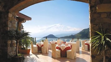 Breakfast, lunch, dinner served; local cuisine, al fresco dining