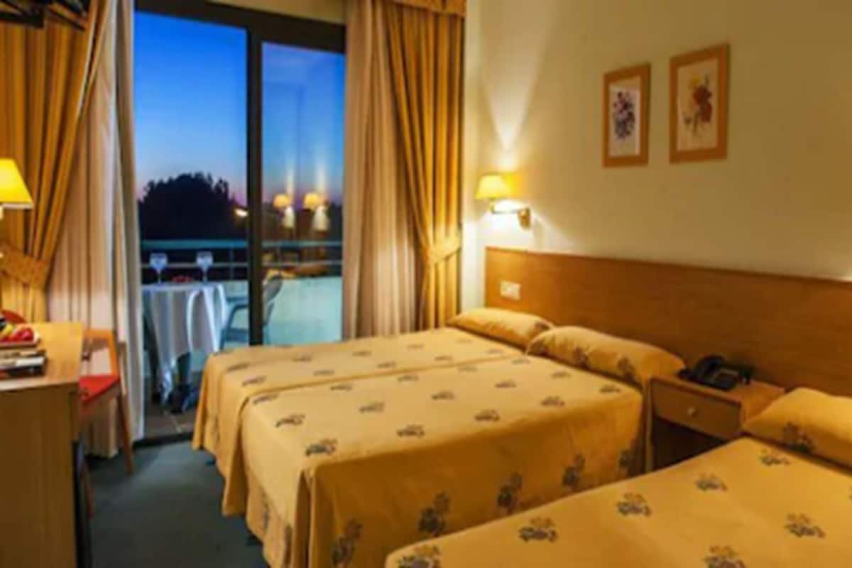 In-room safe, desk, laptop workspace, blackout curtains