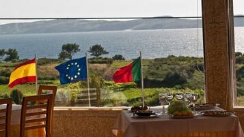 Breakfast, lunch, dinner served; sea views