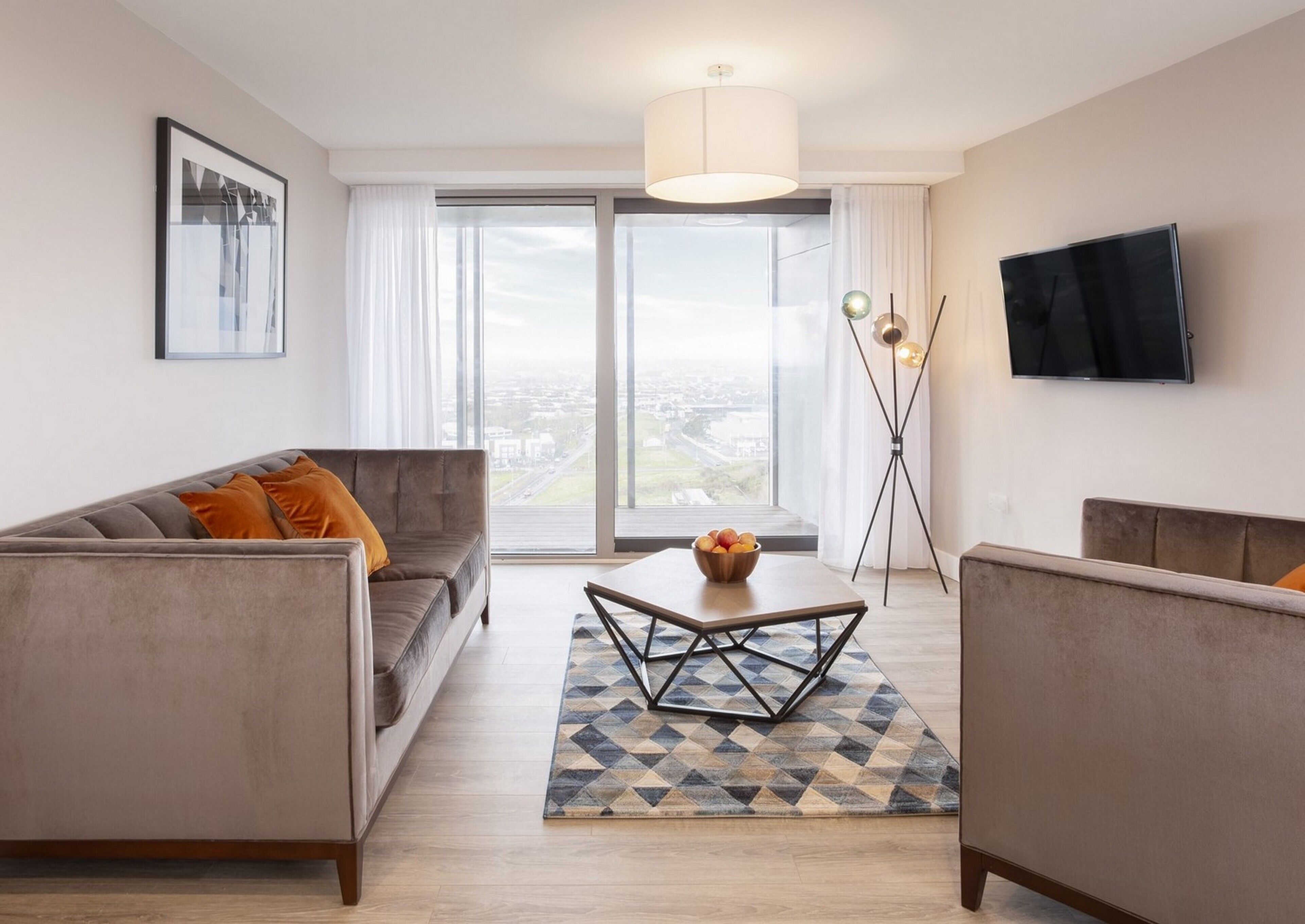 apartment, 2 double beds, city view | living area | led tv