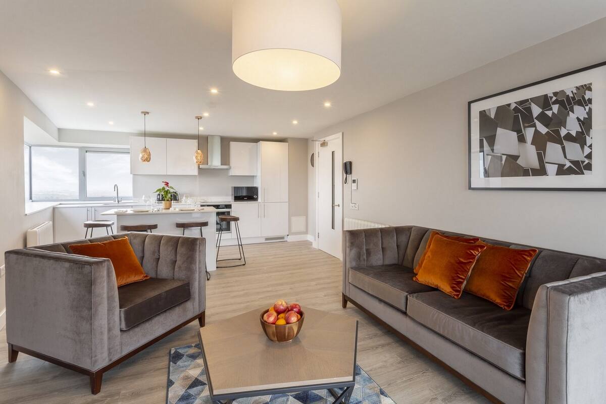 apartment, 2 double beds, city view | living area | led tv