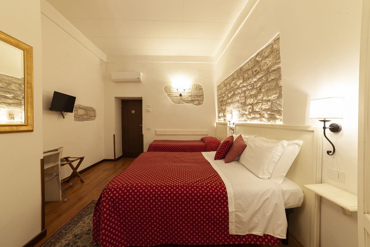 Superior Triple Room | Minibar, blackout drapes, free WiFi