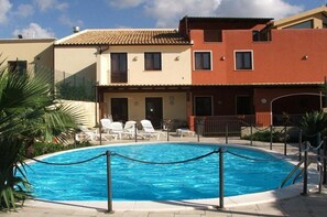 Outdoor pool, pool umbrellas, pool loungers