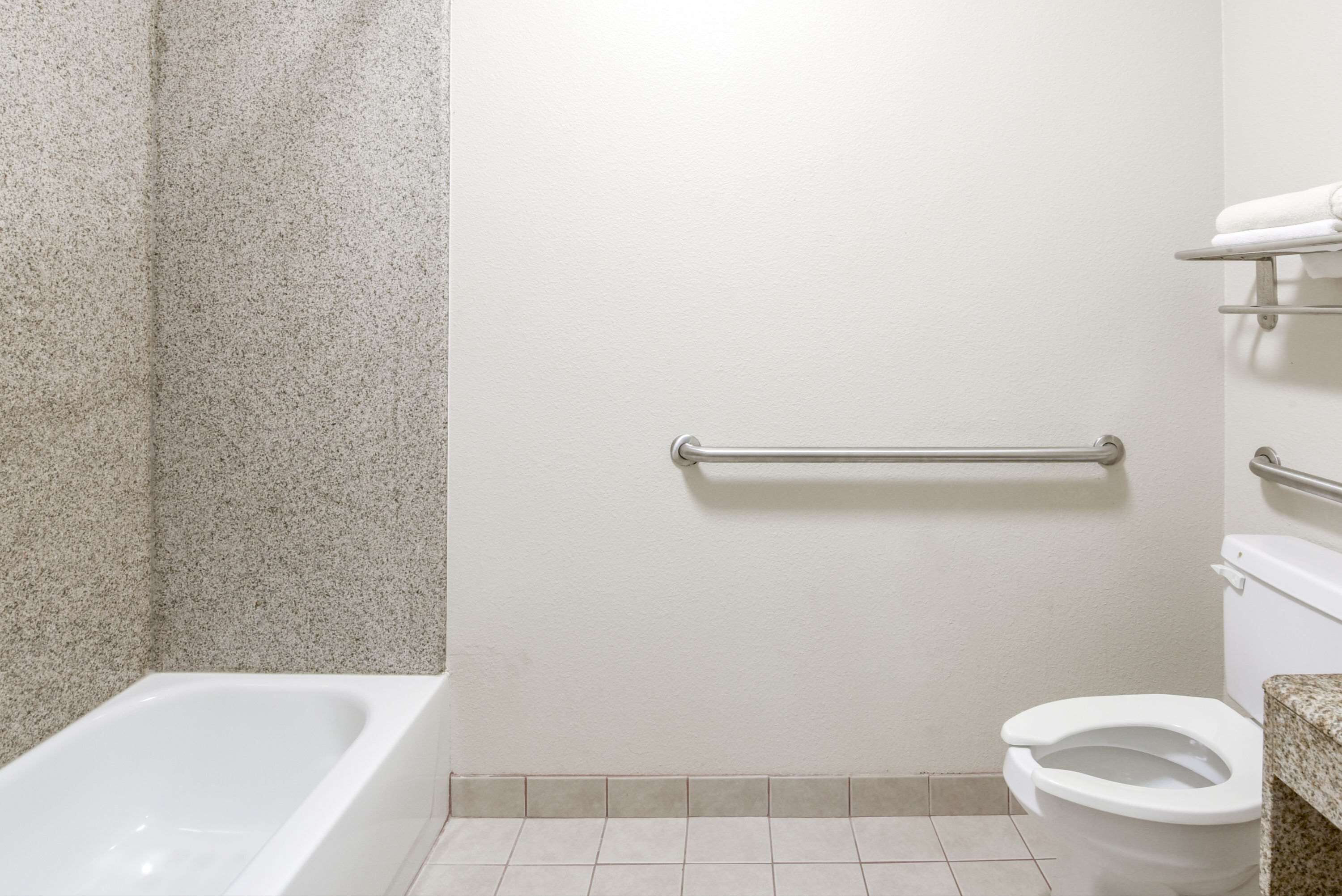 combined shower/bathtub, free toiletries, hair dryer, towels