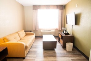 Suite, 1 King Bed, Non Smoking | Desk, soundproofing, free cribs/infant beds, free WiFi